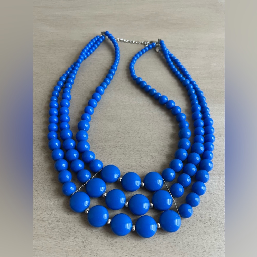 Womens Blue necklace with single silver clasp.